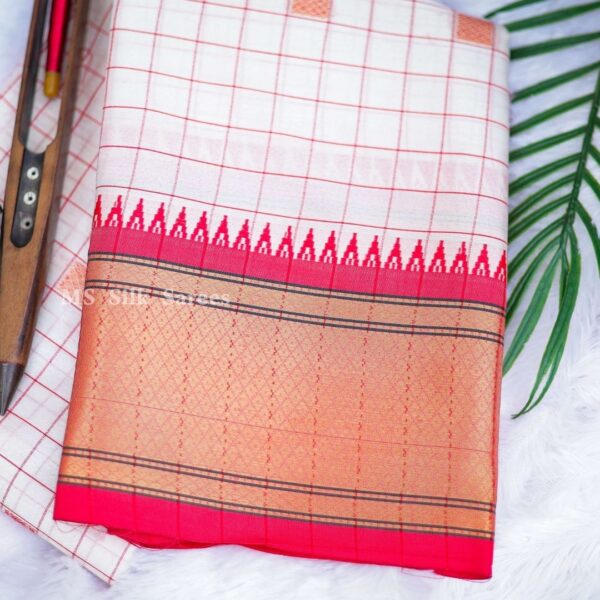 Fancy white saree with red border